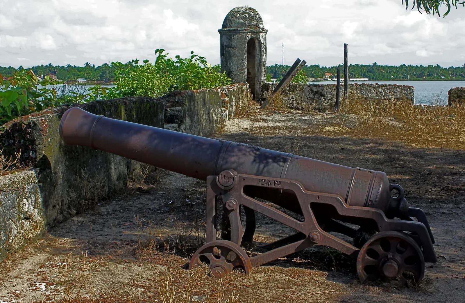 Old cannon on the lagoon ramparts of Batticaloa Fort, Sri Lanka