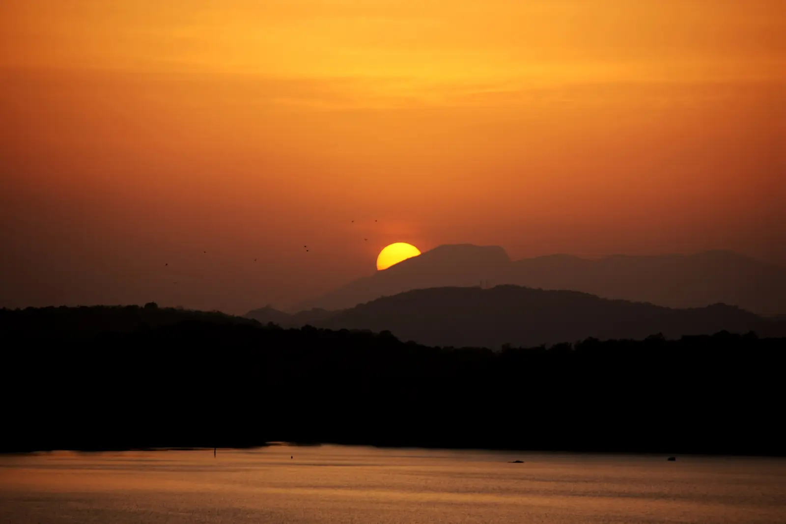 Sunset over Giritale tank near Polonnaruwa, Sri Lanka