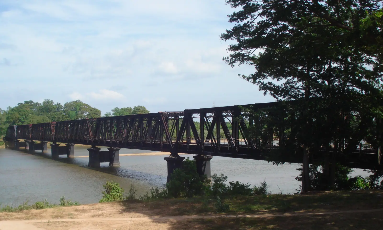 Iron spans of the old Manampitiya bridge over the Mahaweli, Sri Lanka
