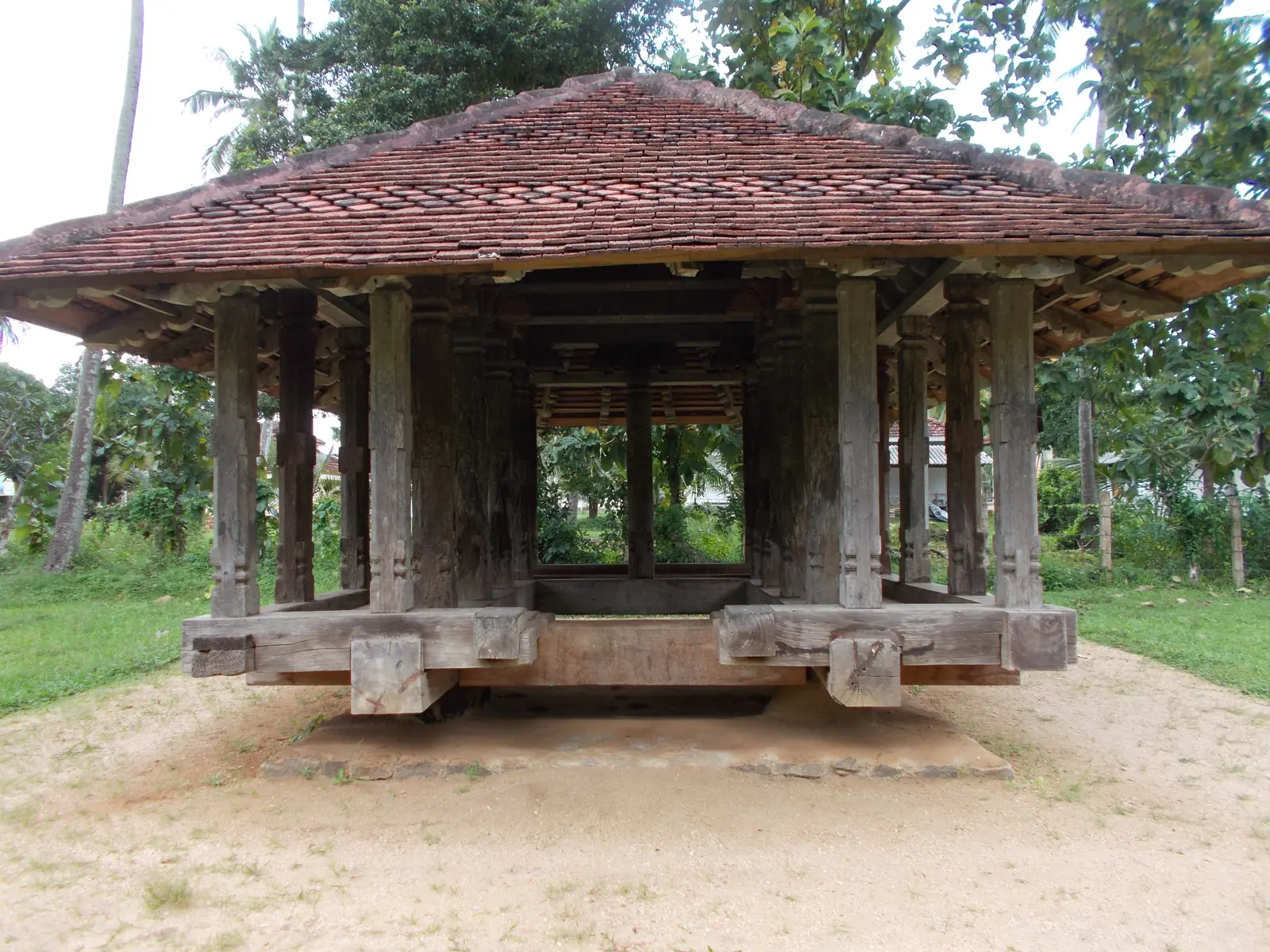 Carved timber rest hall of the Panavitiya Ambalama, Sri Lanka