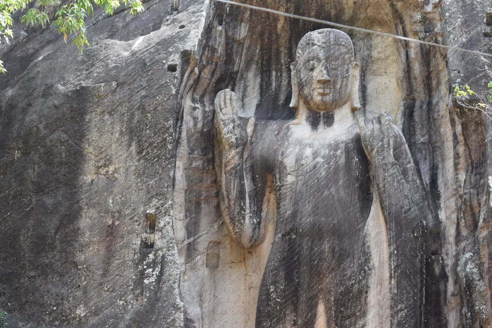 Colossal rock-cut Ras Vehera (Sasseruwa) Buddha statue, Sri Lanka