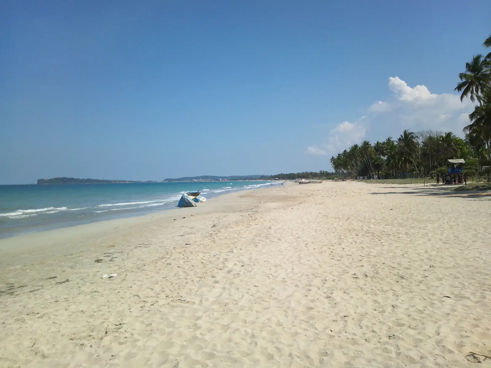 Golden sand of Uppuveli Beach near Trincomalee, Sri Lanka